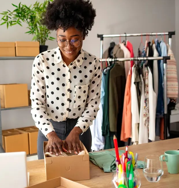 woman packing apparel